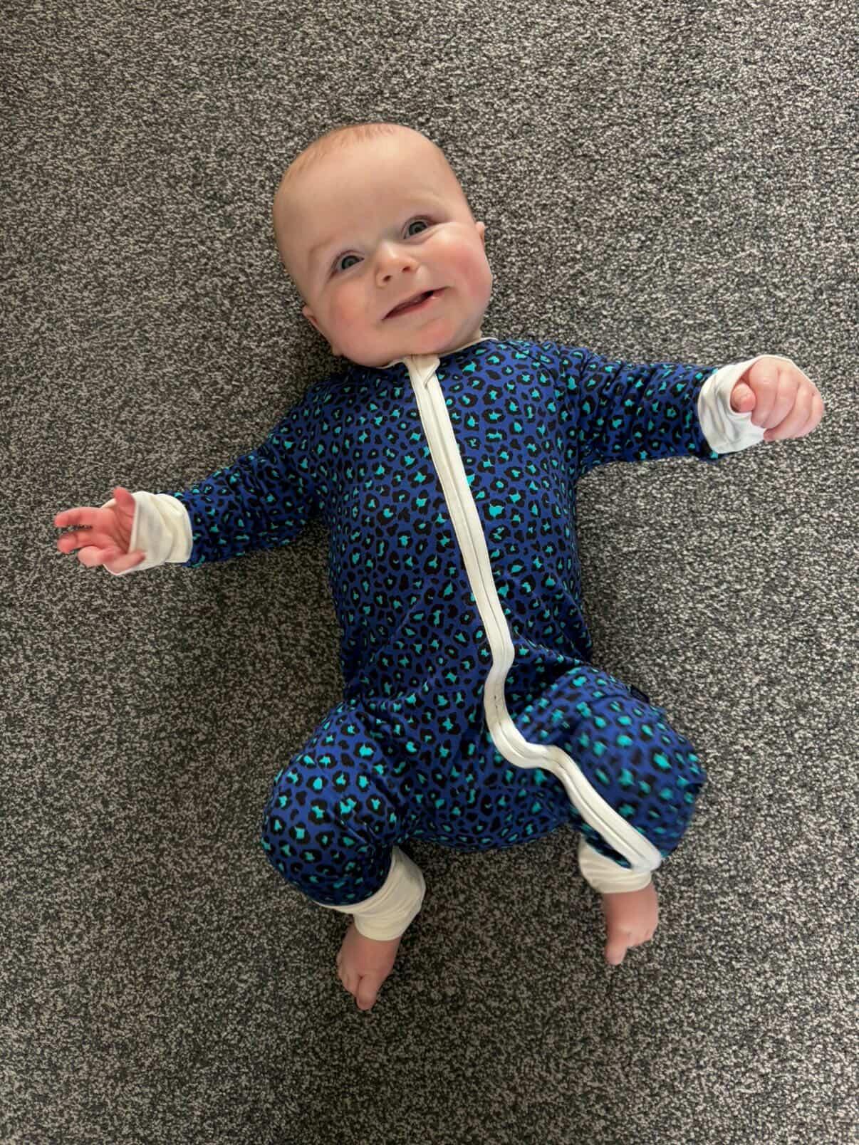 Bamboo zip sleepsuit in midnight leopard