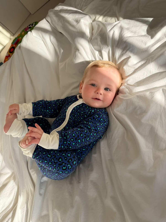 Bamboo zip sleepsuit in midnight leopard