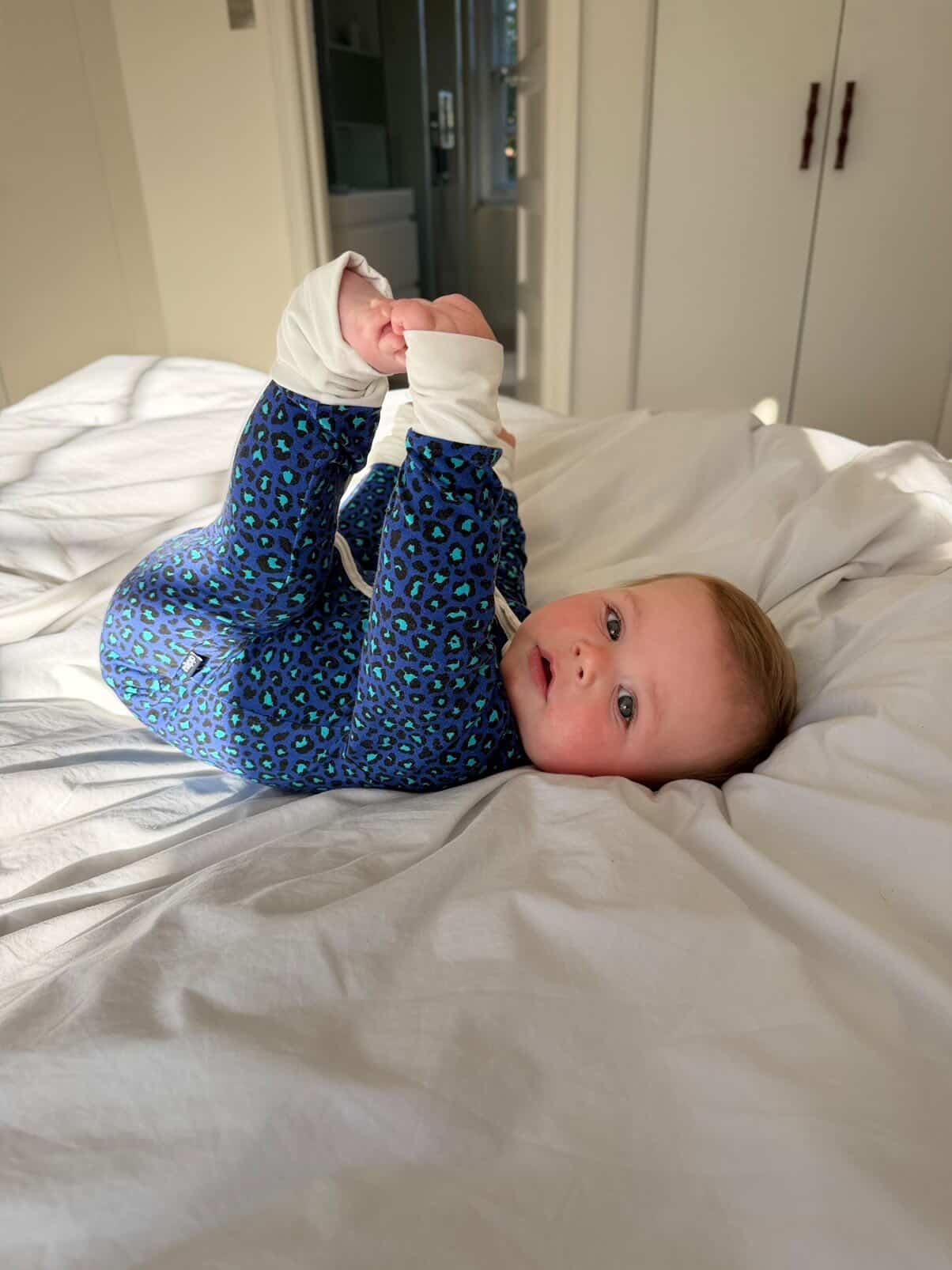 Bamboo zip sleepsuit in midnight leopard