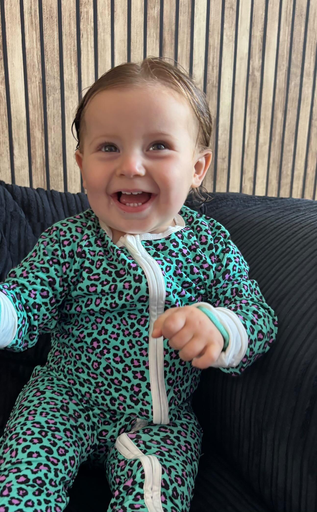 Bamboo zip sleepsuit in forest orchid leopard