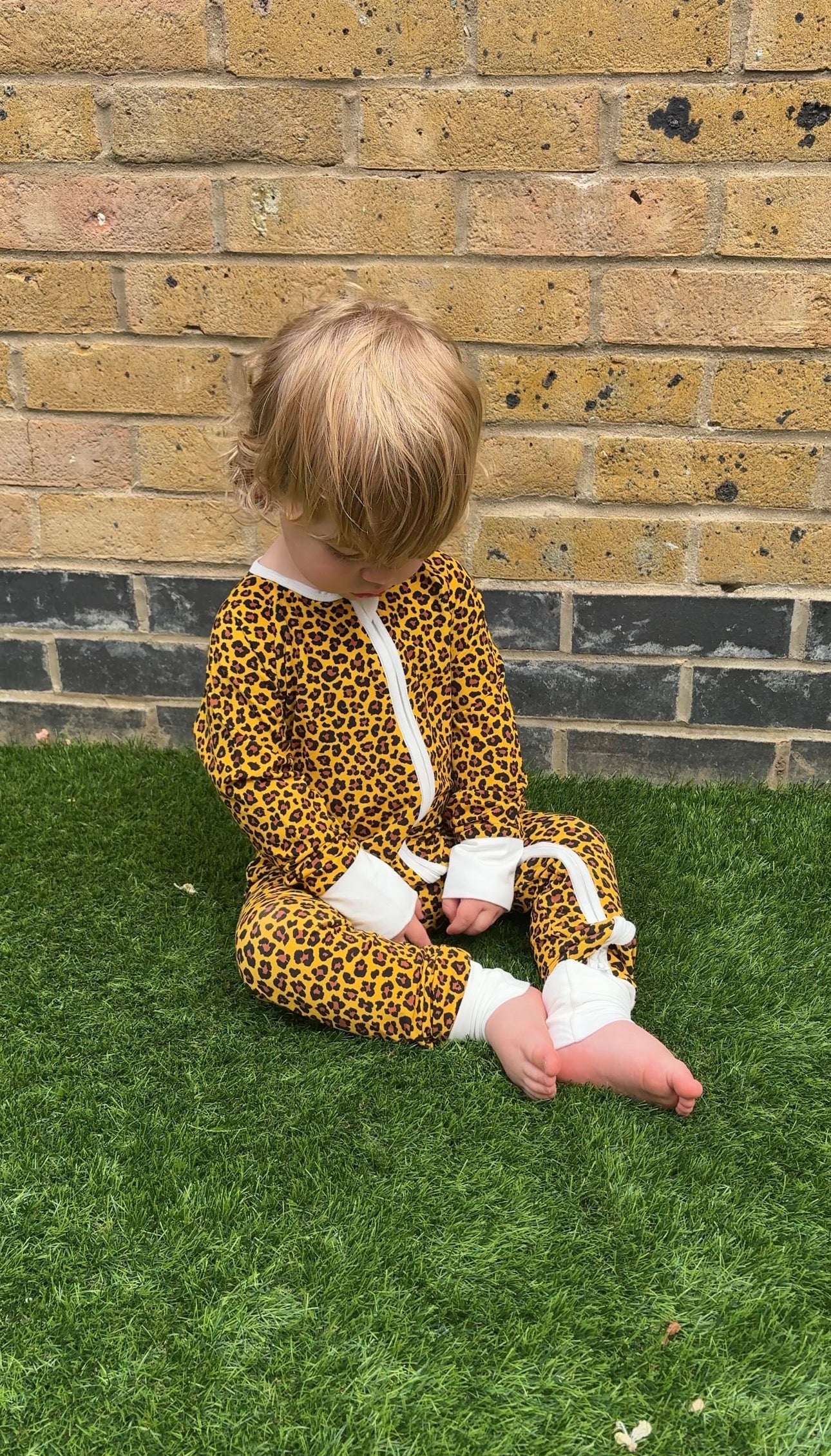 Bamboo zip sleepsuit in sand leopard