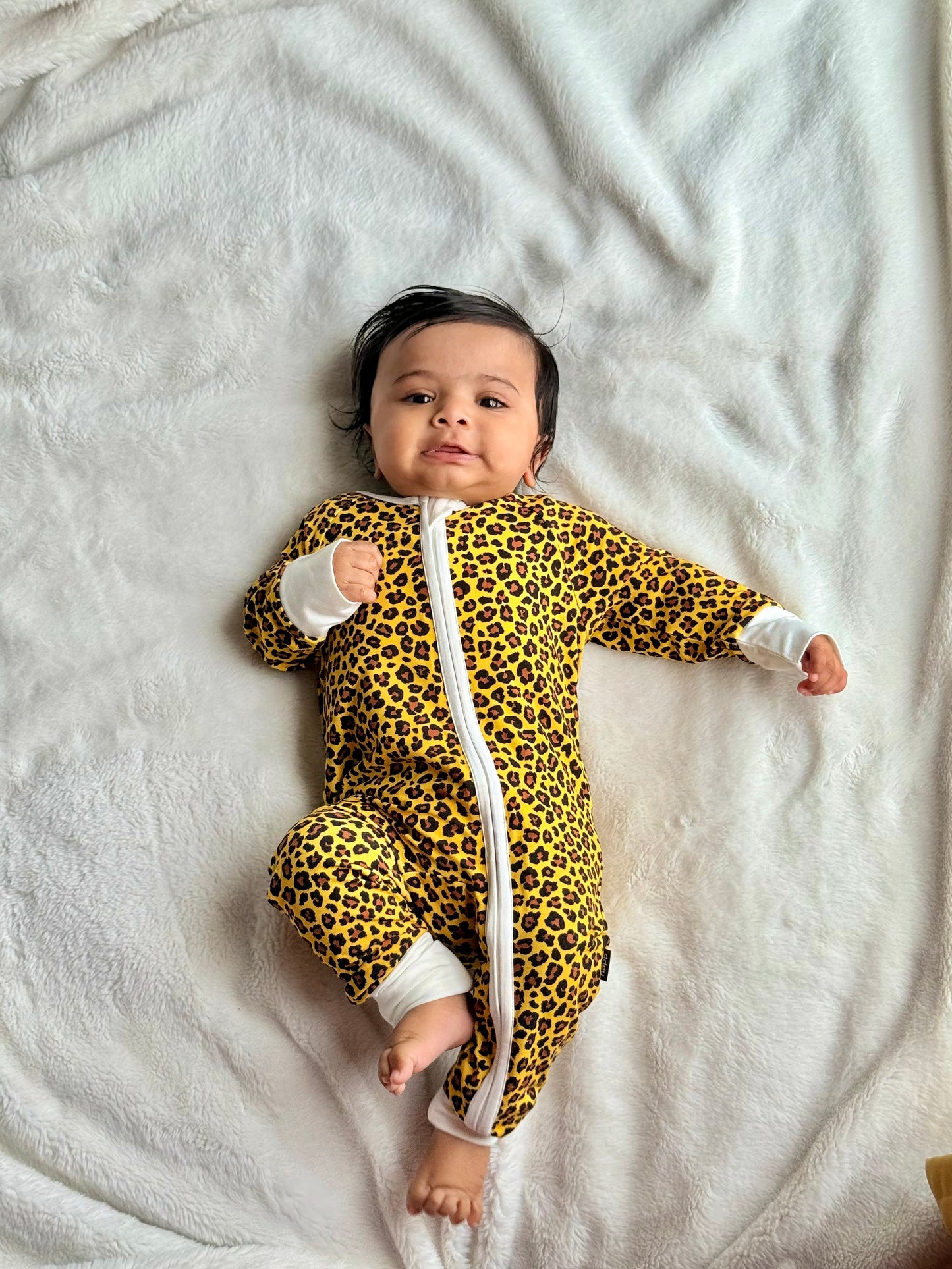 Bamboo zip sleepsuit in sand leopard