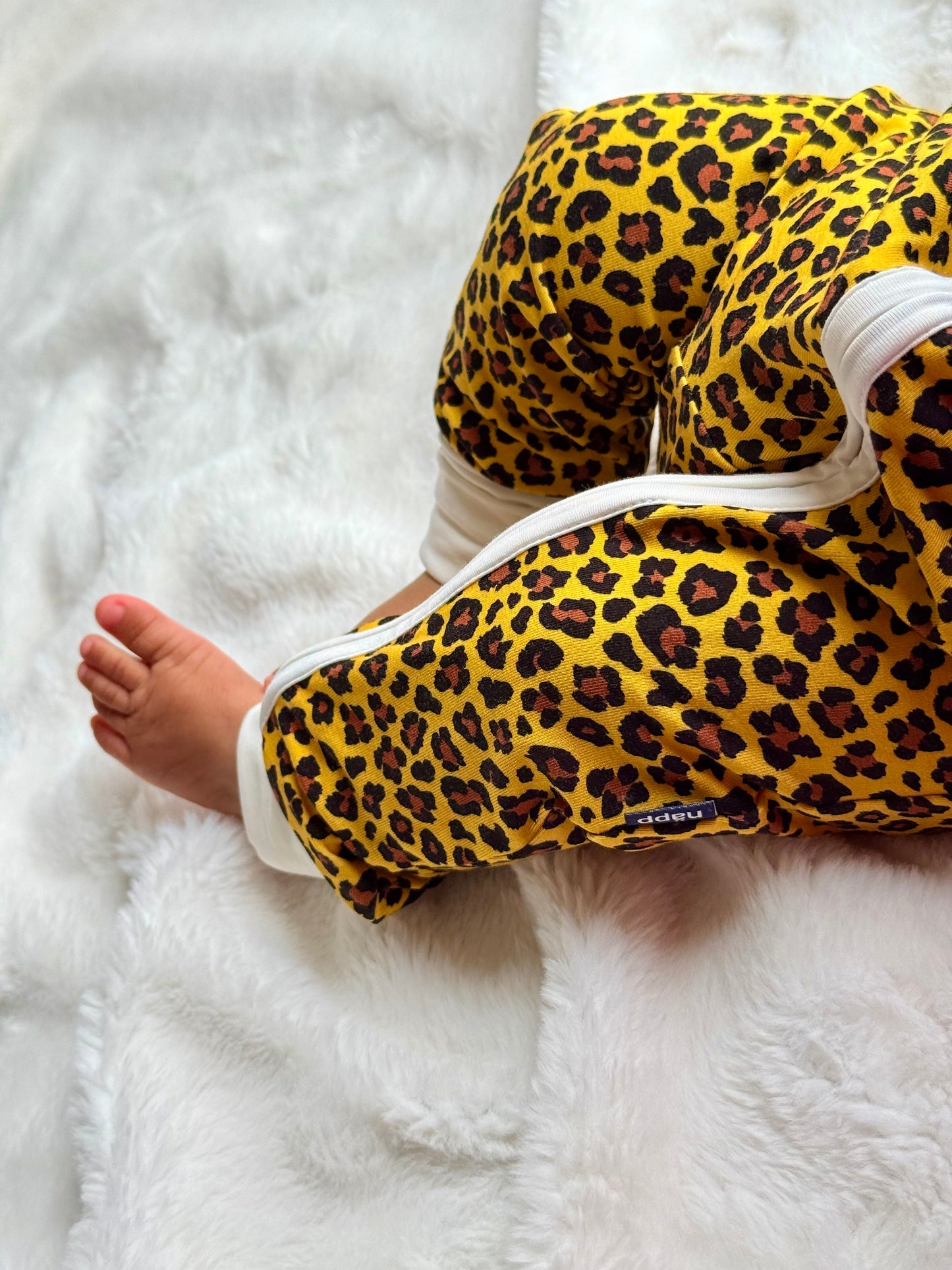 Bamboo zip sleepsuit in sand leopard