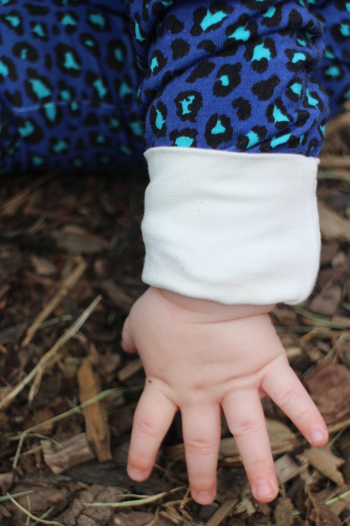 Bamboo zip sleepsuit in midnight leopard